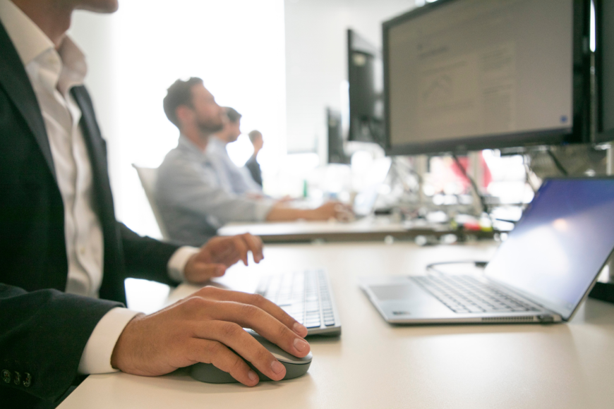 CE Employee at desk